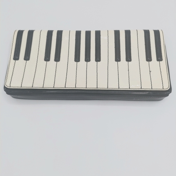 kate spade Handbags - Kate Spade RARE Duet Key Clutch with tags